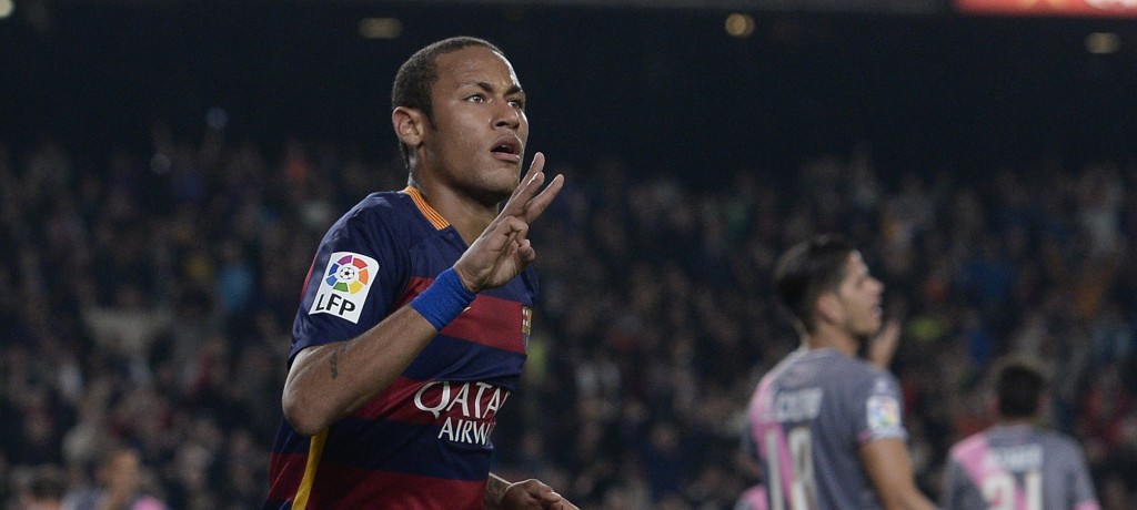 Barcelona's Brazilian forward Neymar da Silva Santos Junior celebrates his goal during the Spanish league football match FC Barcelona vs Rayo Vallecano de Madrid at the Camp Nou stadium in Barcelona on October 17, 2015.   AFP PHOTO/ JOSEP LAGO