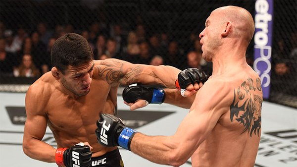 Rafael dos Anjos atropela desafiante e mantém cinturão em primeira defesa - Divulgação